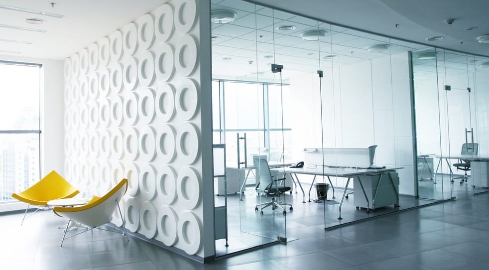 What are the uses and benefits of glass partitions?